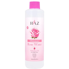 HAZ Premium Rose Water bottle with a pink cap and a pink label featuring a rose graphic, on a white background.
